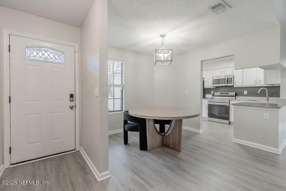 8755 Huntington Woods Cir N - Photo 2 of 36