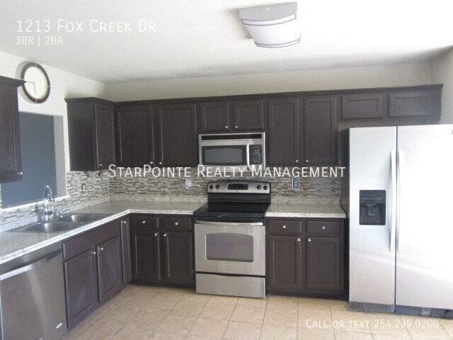 1213 Fox Creek Dr - Photo 5 of 13
