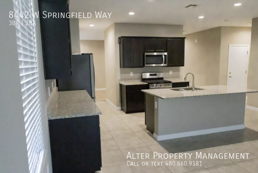 8442 W Springfield Way - Photo 3 of 32