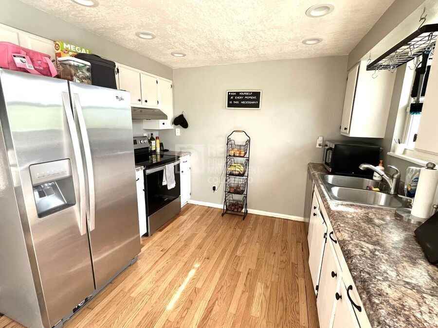 7368 Tilden St - Photo 4 of 20