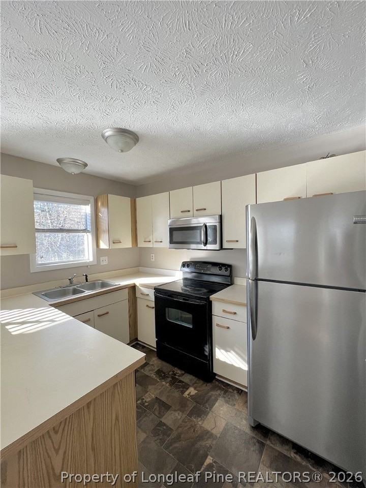 1018 Wood Creek Dr #9 - Photo 5 of 14