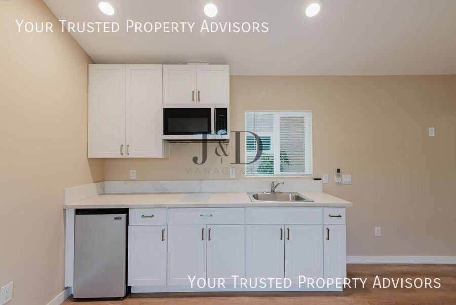 1136 S Quince St - Photo 5 of 13