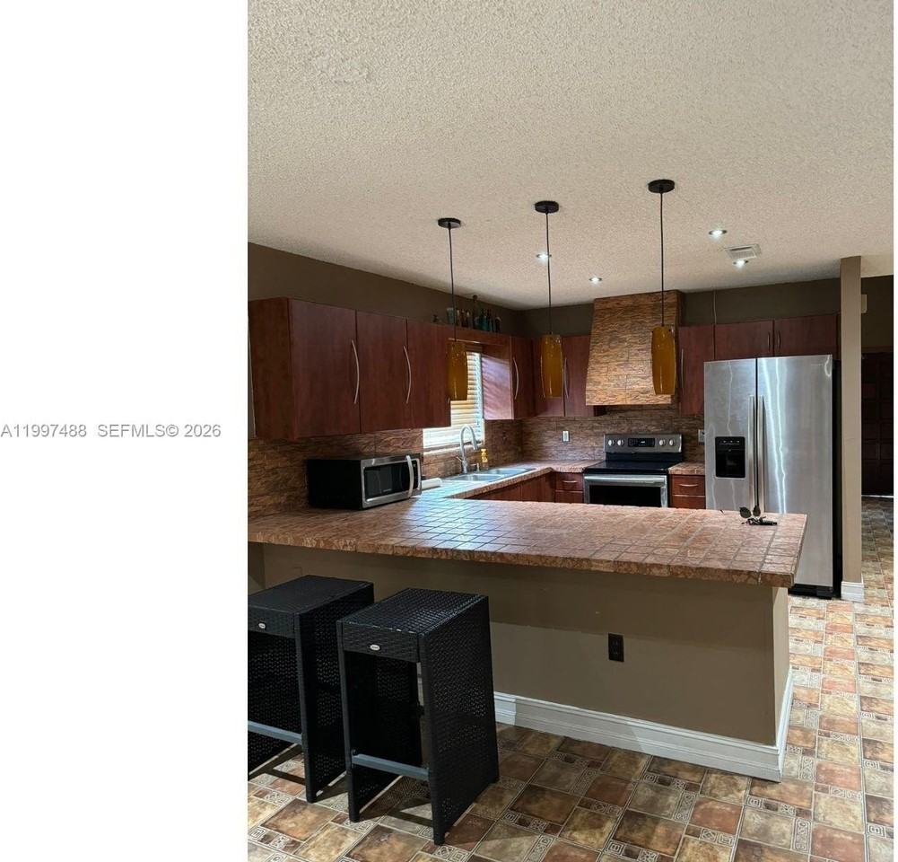 6936 W 25th Ave - Photo 5 of 11