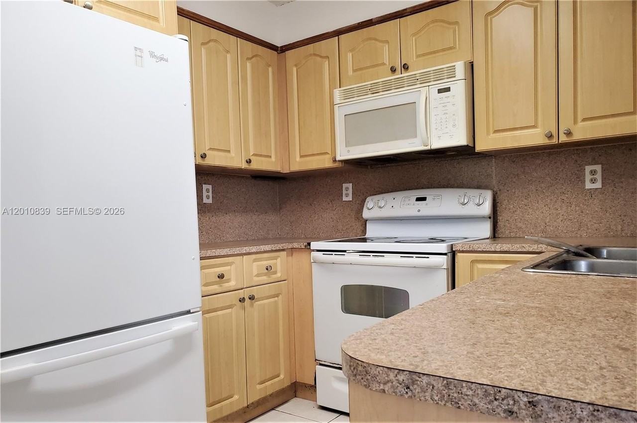 10020 Nw 9th Street Cir #102 - Photo 5 of 15