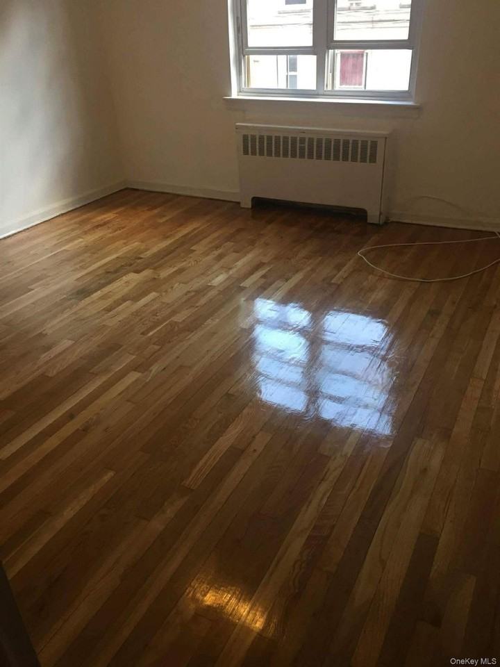 1454 E 233rd St #1 - Photo 2 of 4