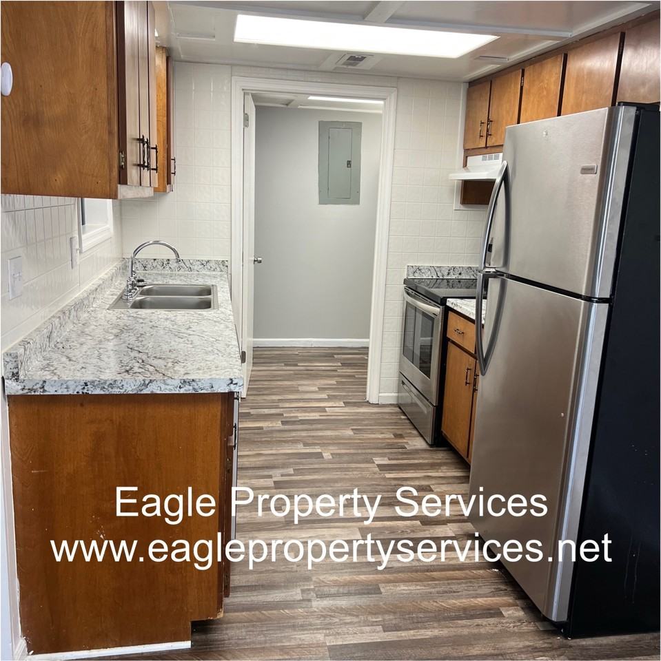 The Raintree Apartments - Photo 2 of 7