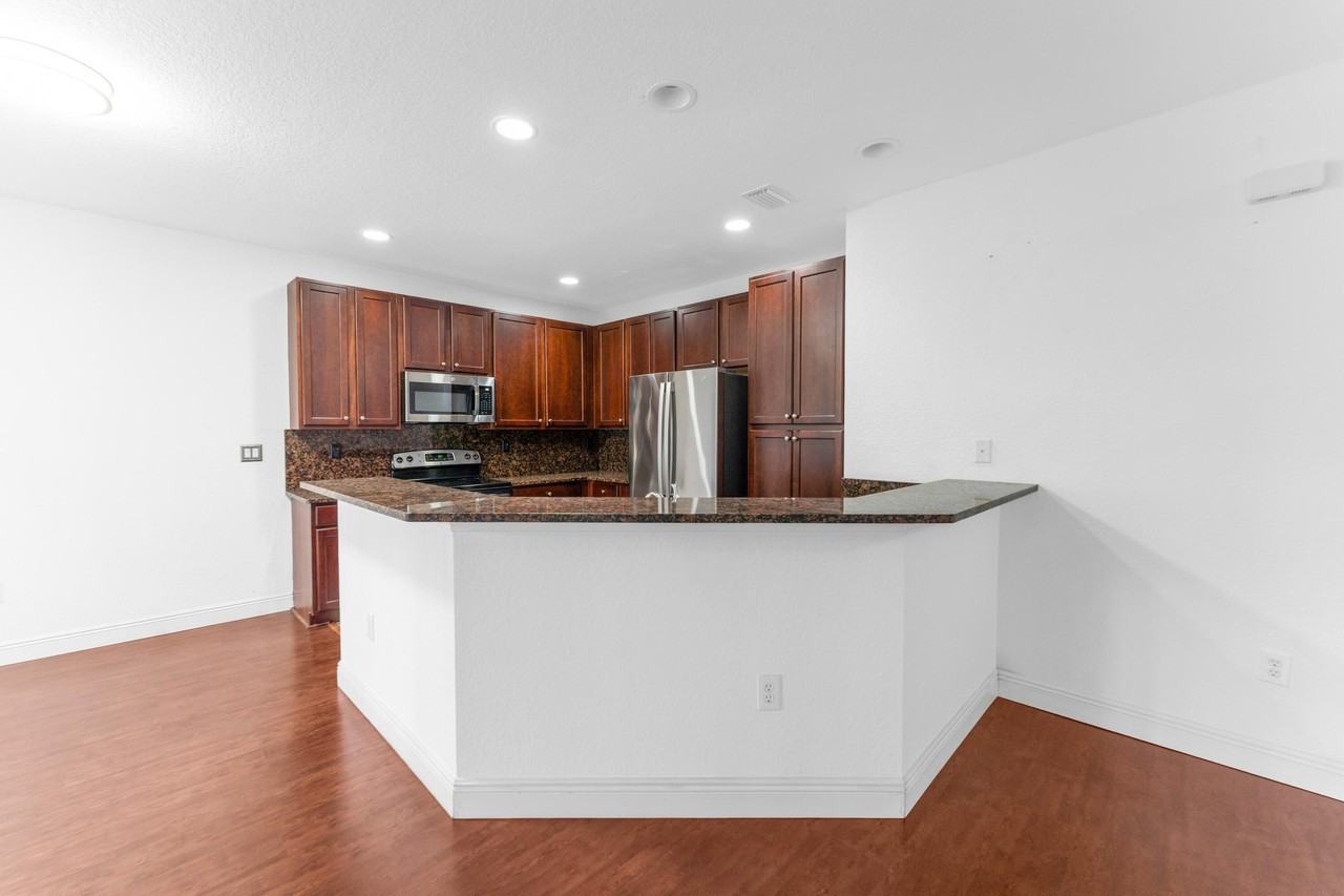 6077 Grand Cypress Cir W - Photo 2 of 24