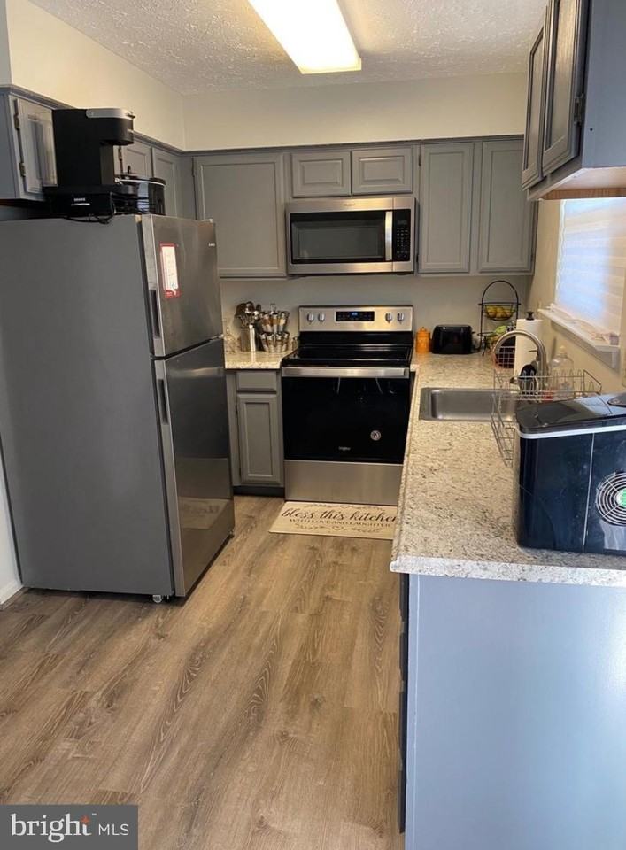 6276 Whistlers Pl - Photo 2 of 19