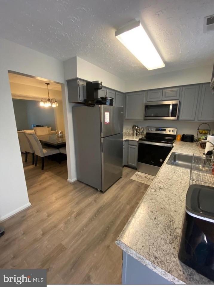 6276 Whistlers Pl - Photo 3 of 19
