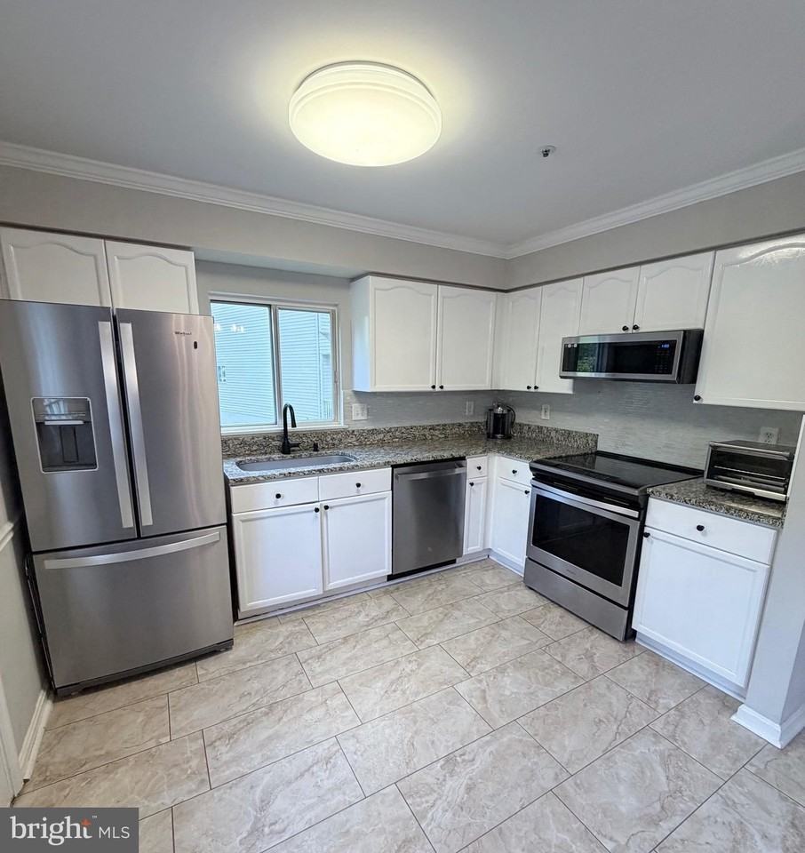 25754 Woodfield Rd - Photo 4 of 16