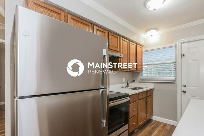 239 93rd Ave N - Photo 5 of 16