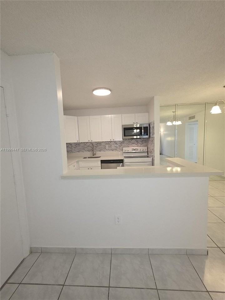 823 Ne 199th St #104-12 - Photo 6 of 43
