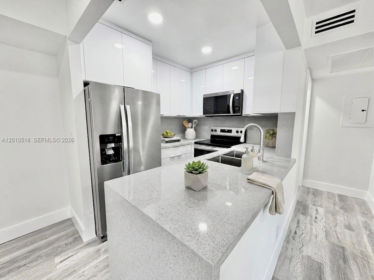 10031 Winding Lake Rd #201 - Photo 5 of 18