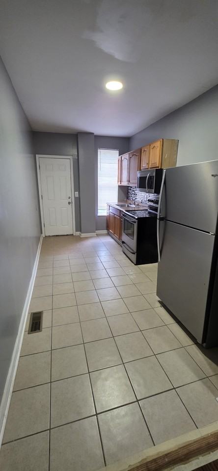 1710 N Milton Ave - Photo 6 of 15