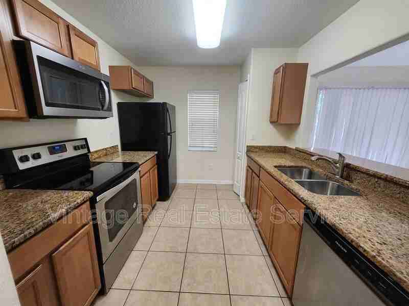 10932 Keys Gate Dr - Photo 6 of 25