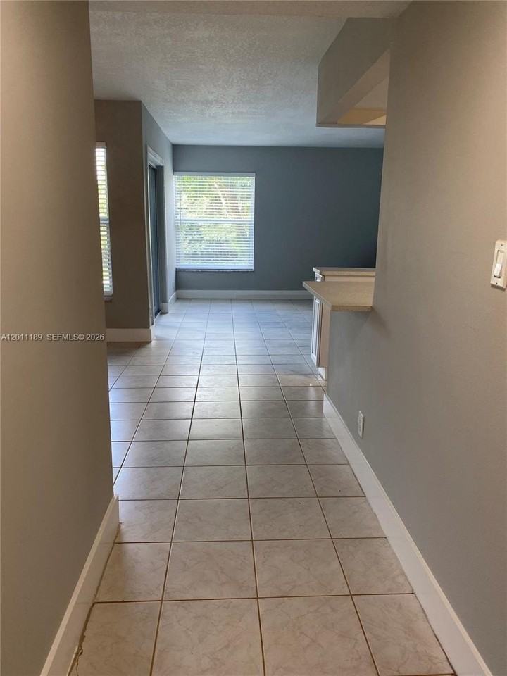455 S Pine Island Rd #110C - Photo 3 of 30