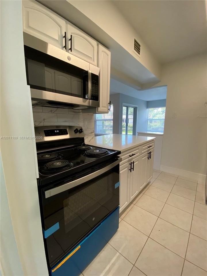 455 S Pine Island Rd #110C - Photo 6 of 30