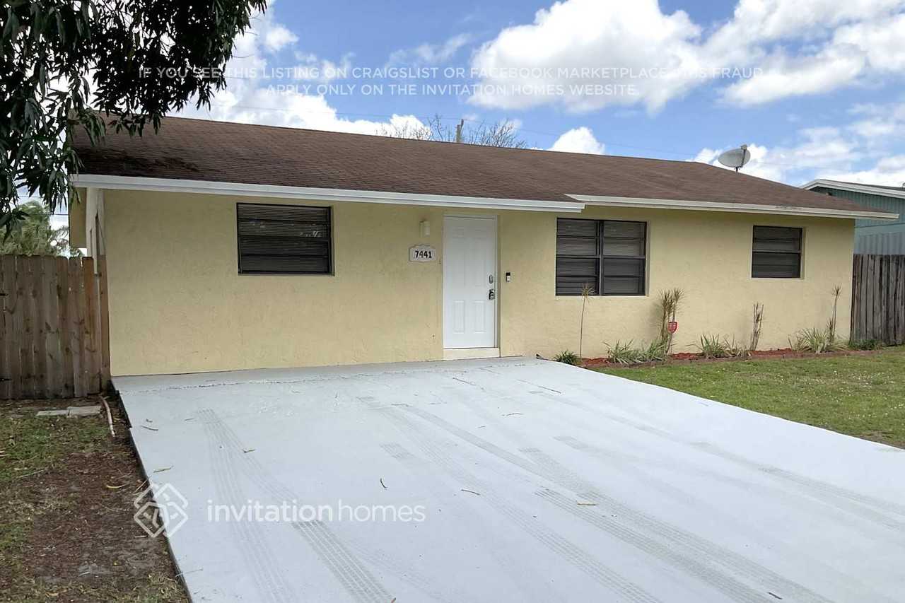 7441 Douglas St - Photo 2 of 15