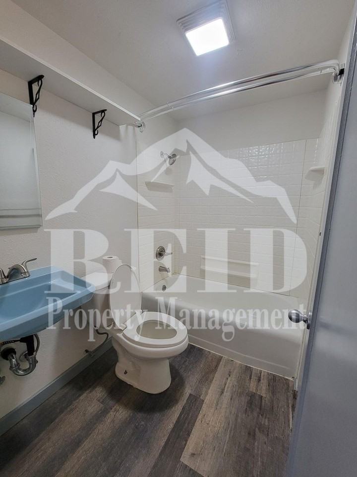1212 Evans Ave W - Photo 7 of 27