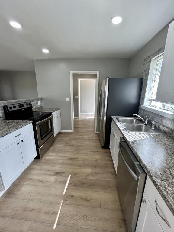 1219 Logan St - Photo 4 of 14