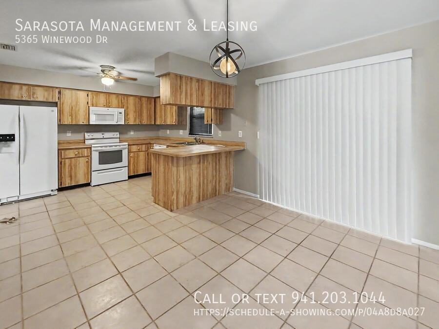 5365 Winewood Dr - Photo 4 of 15