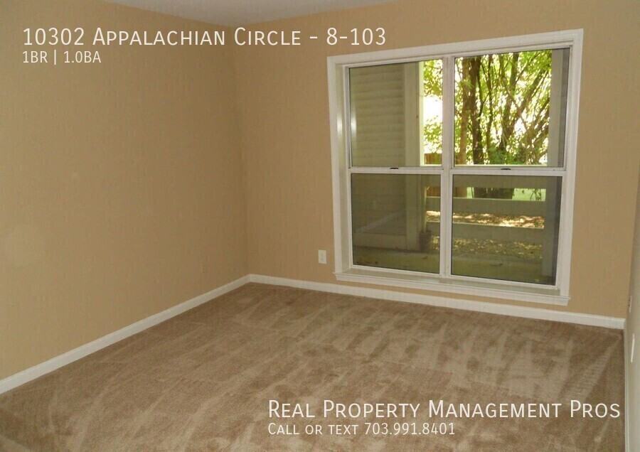 10302 Appalachian Cir #8-103 - Photo 3 of 6