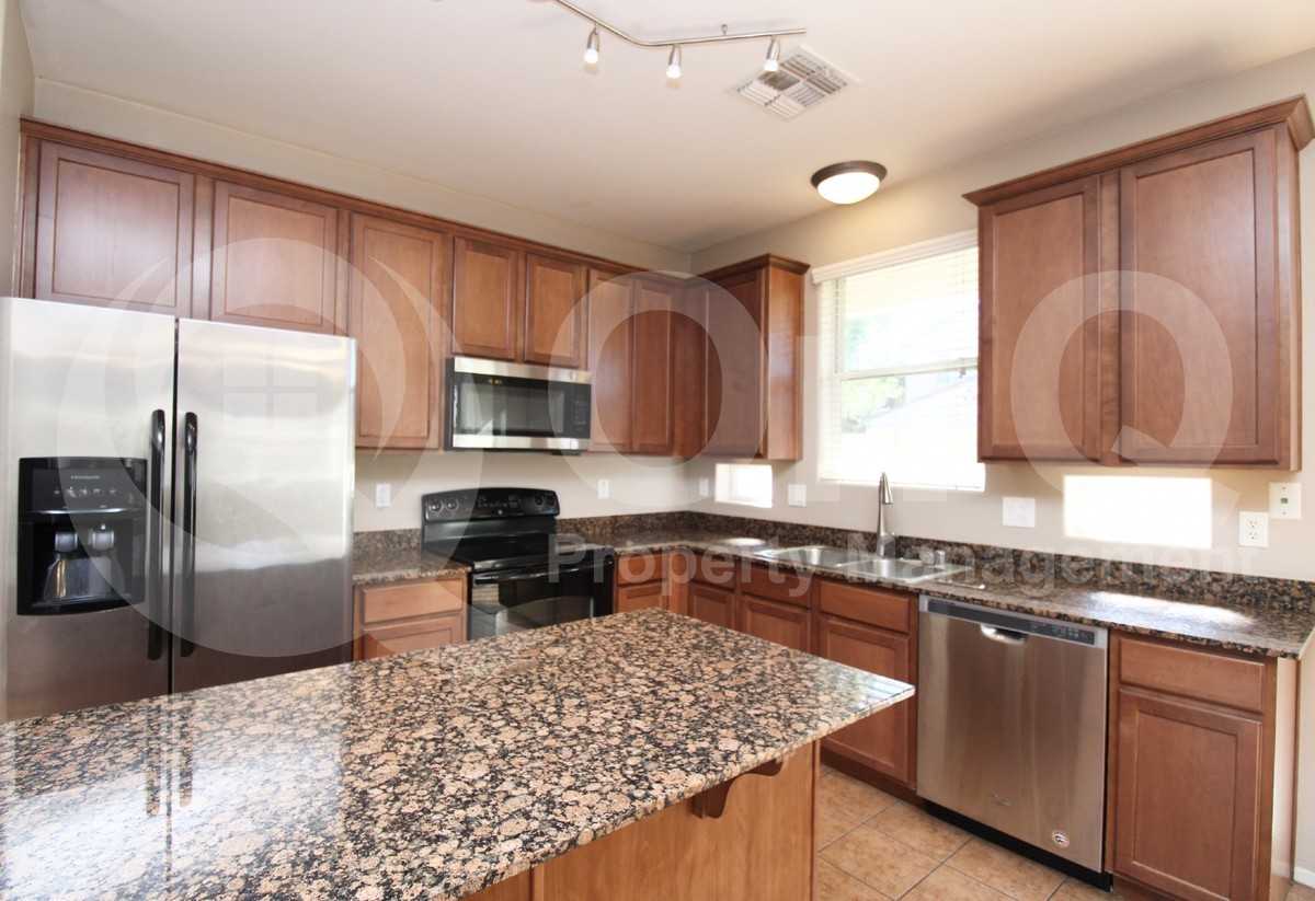 10031 E Impala Ave - Photo 3 of 16