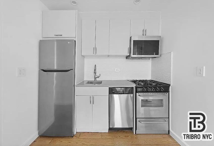 105 Moore St - Photo 4 of 7