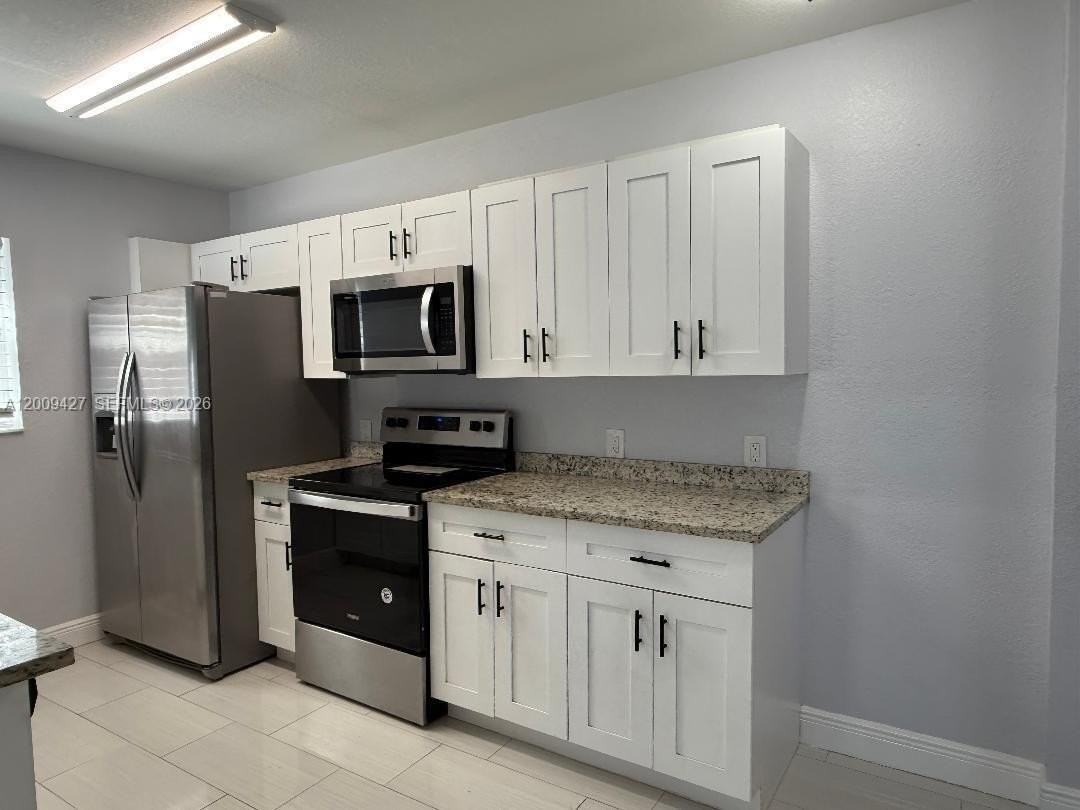 2713 Nw 6th St - Photo 2 of 22