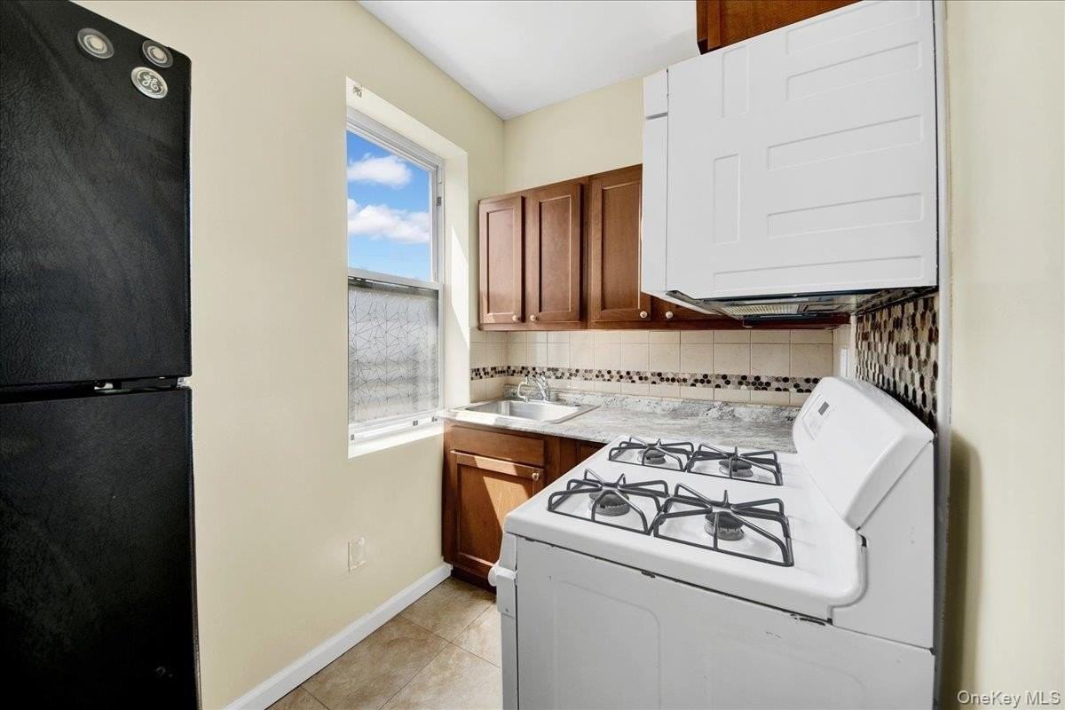 1129 E 221st St #3 - Photo 2 of 13
