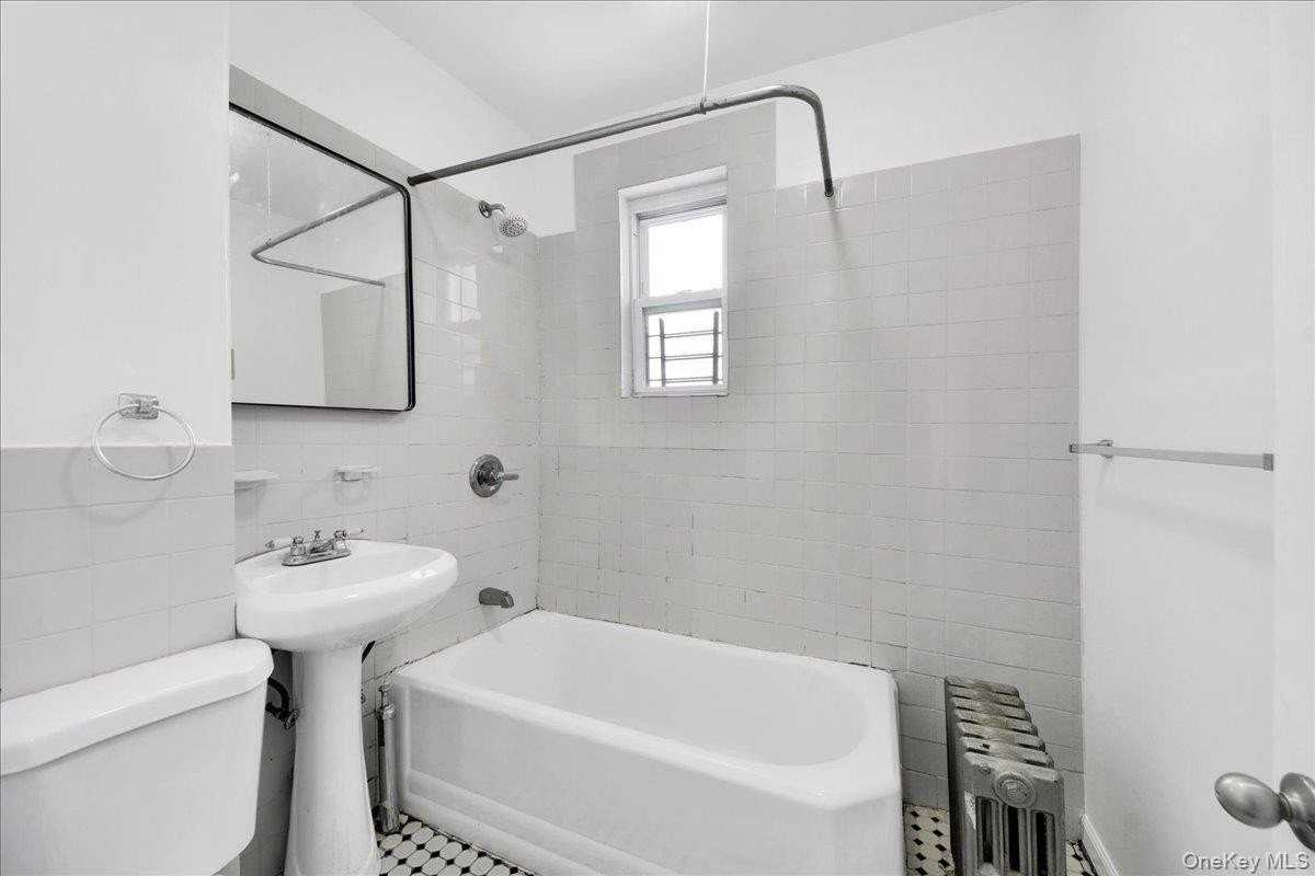 1129 E 221st St #3 - Photo 3 of 13
