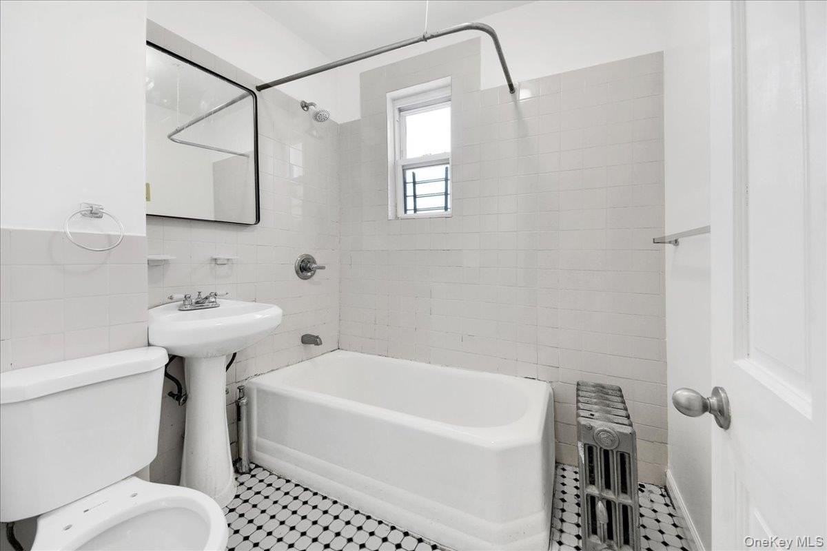 1129 E 221st St #3 - Photo 4 of 13