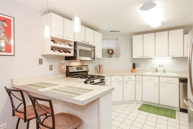 2839 N Burling St #G - Photo 2 of 11