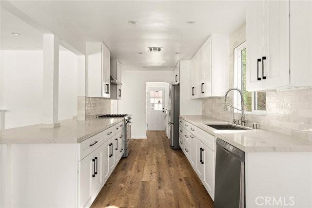5840 Allott Ave - Photo 3 of 8