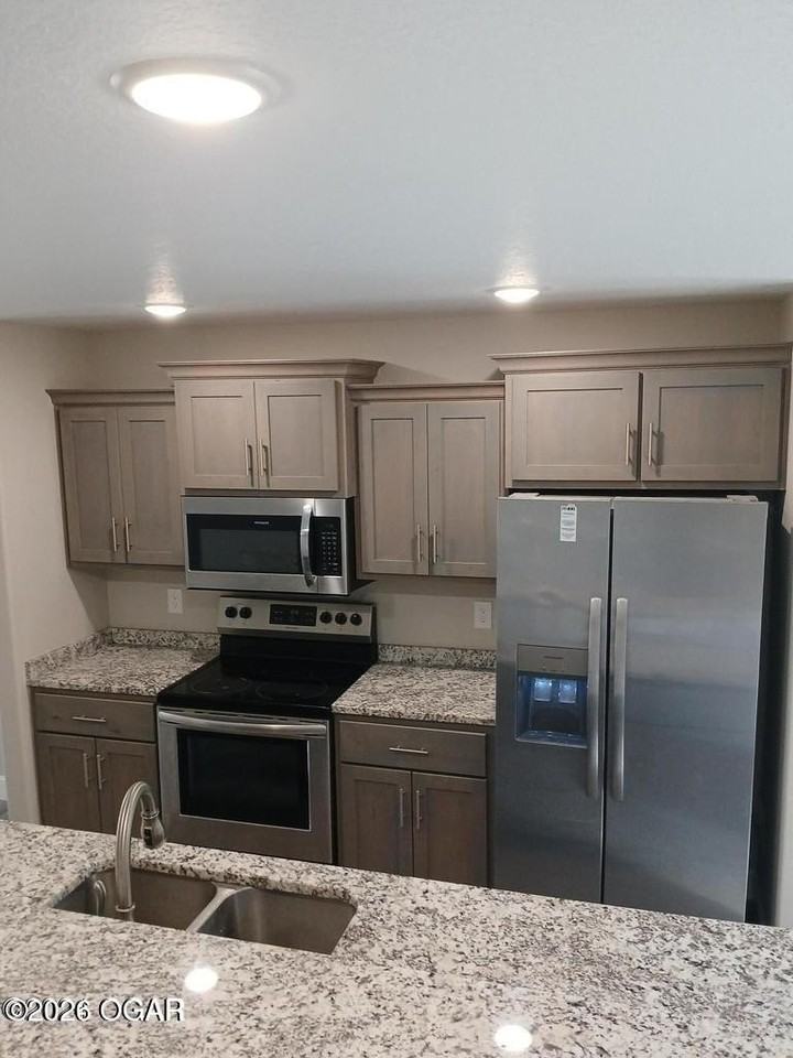 2606 S Moffet Ave - Photo 3 of 3