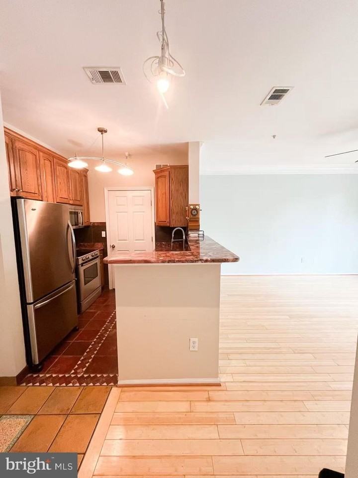 1570 Spring Gate Dr #7109 - Photo 3 of 21