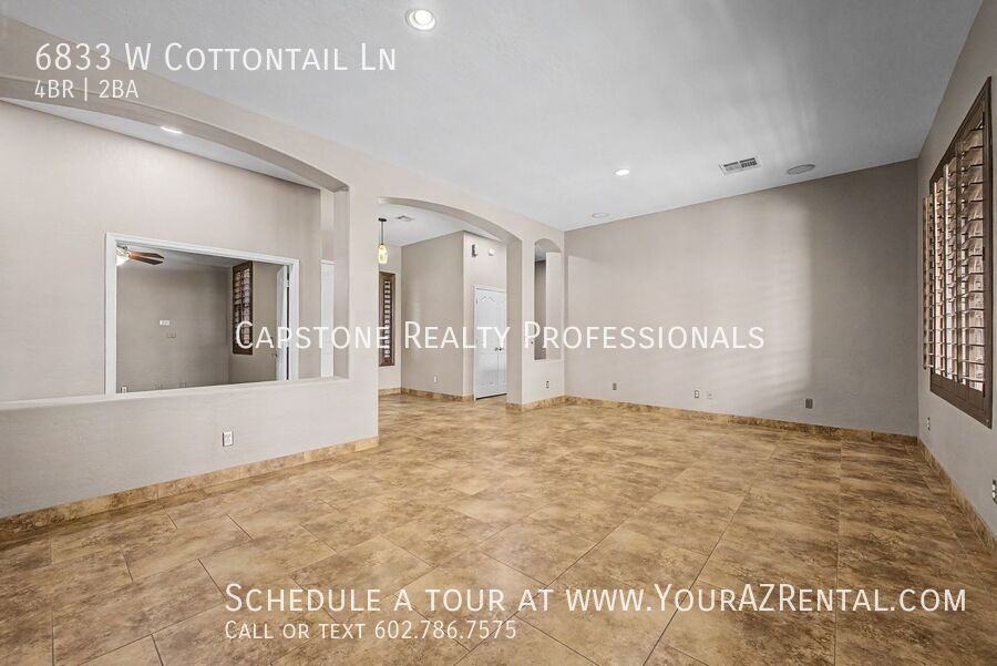 6833 W Cottontail Ln - Photo 5 of 29