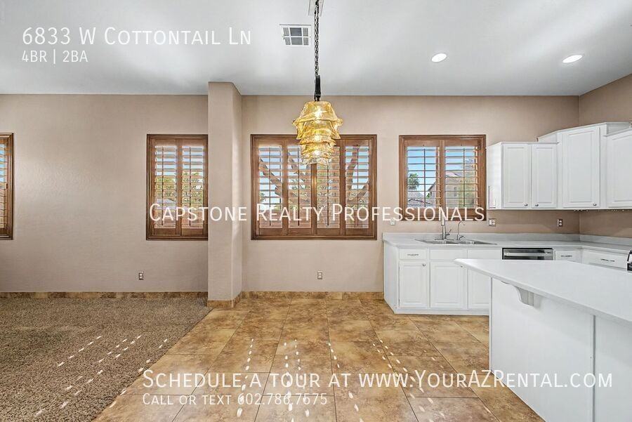 6833 W Cottontail Ln - Photo 7 of 29