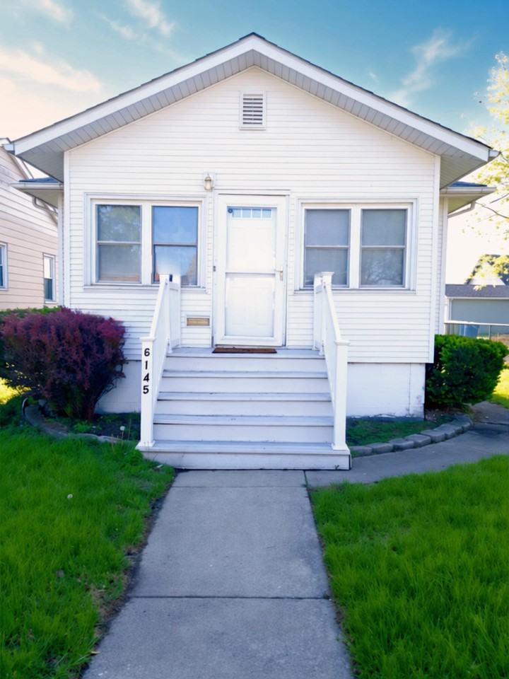 6145 Noble Ave - Photo 4 of 6