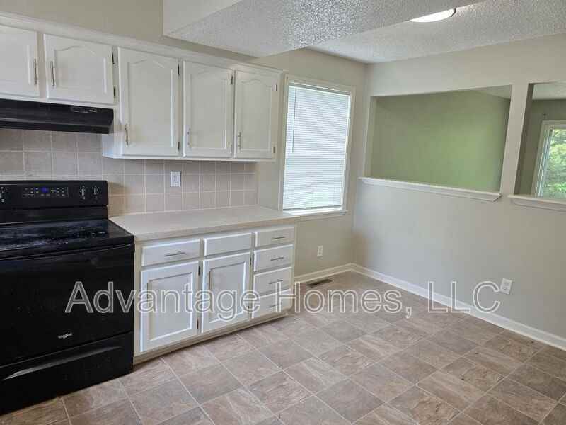 7838 W 61st Ter - Photo 4 of 26