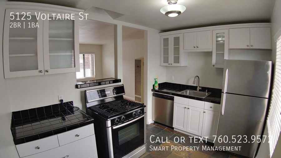 5125 Voltaire St - Photo 5 of 31