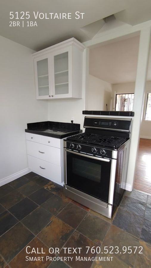 5125 Voltaire St - Photo 7 of 31