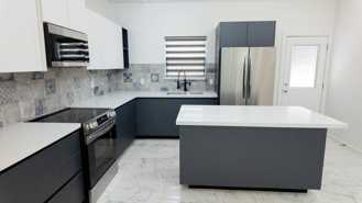 3BR Apartment w/ High Ceilings, Upgraded Appliances & Large Yard - Photo 1 of 1