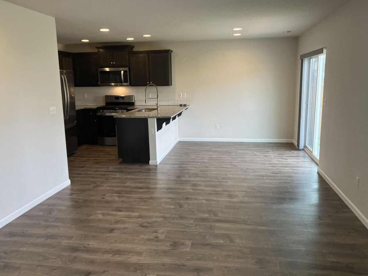 4927 Orbit Ave Ne - Photo 3 of 26
