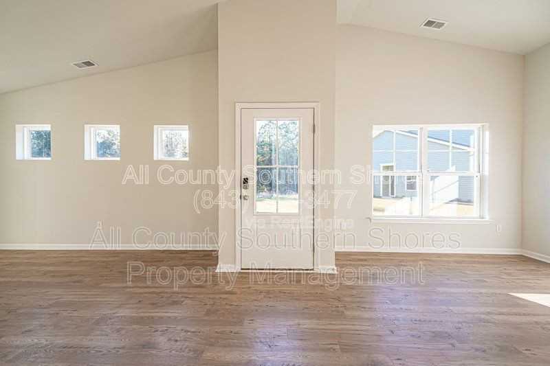 7023 Rivers Bridge Ct - Photo 5 of 40