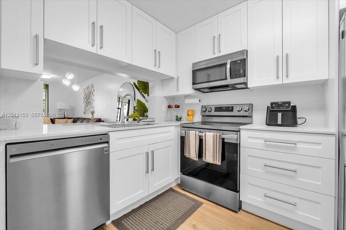 1234 S Military Trl #1811 - Photo 3 of 37