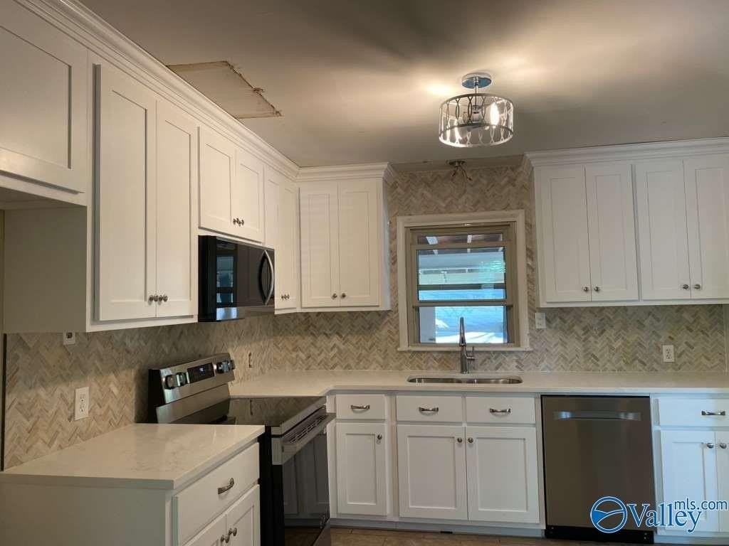 2002 Chambers Dr Ne - Photo 3 of 36
