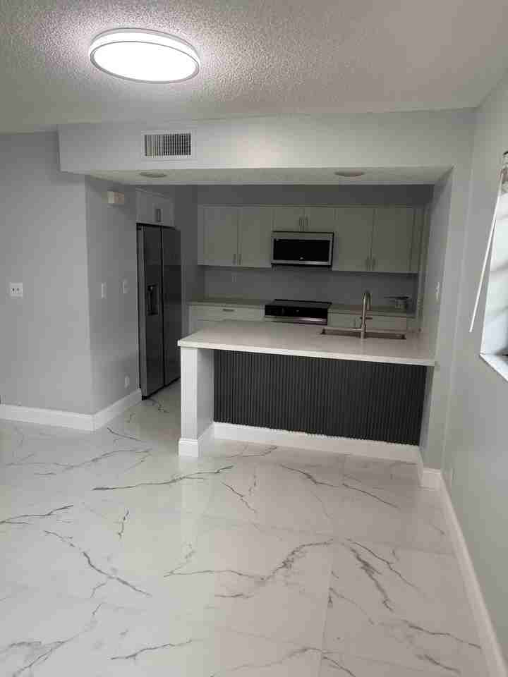 9150 Nw 38th Dr #106 - Photo 7 of 25