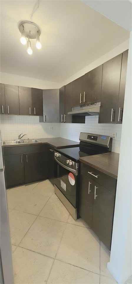304 Nw 30th Ct #102 - Photo 5 of 15
