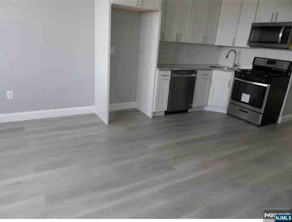 209 Avenue F ##2 - Photo 2 of 6